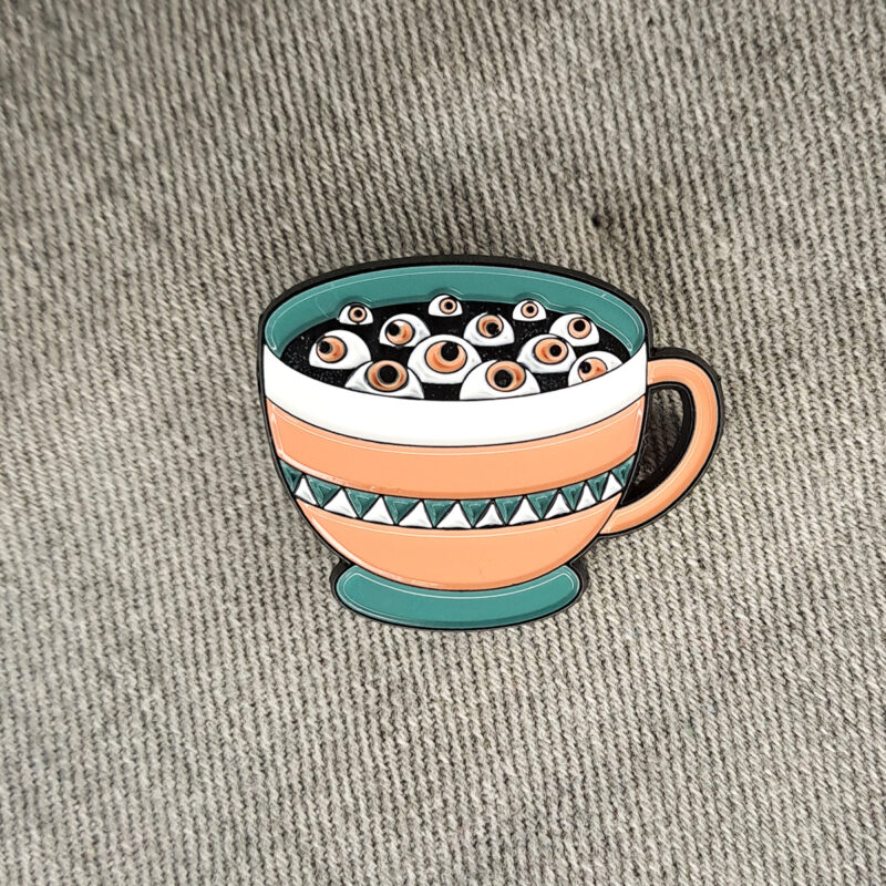 Cup of eyes kitűző